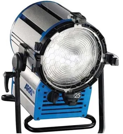 ARRI 2K tungsten fresnel on its yoke with scrim guard