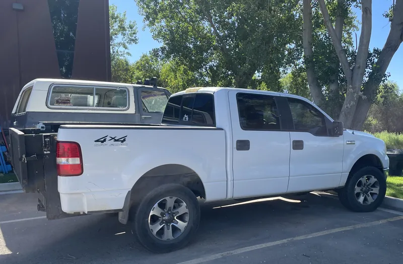 Ford F150 with 12 by 8 foot box and lift gate