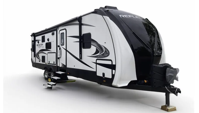 Makeup and wardrobe trailer with slide-out sides parked on location