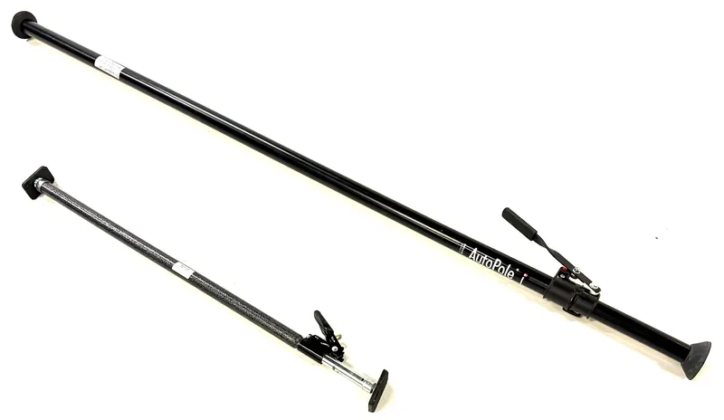Adjustable pole cat wall spreader used to rig lights between walls