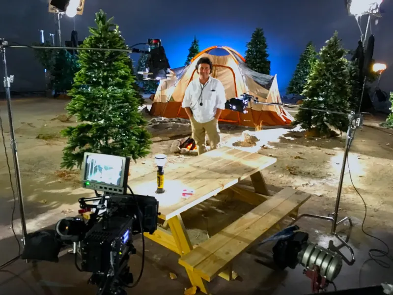 Director reviewing a take at the monitor on stage