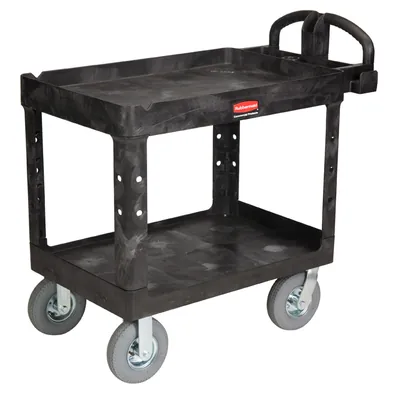 Rolling two-level production cart with carpet inlays and 10 inch tires