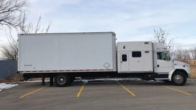 5 ton Freightliner FL80 semi truck with 22 foot box and lift gate